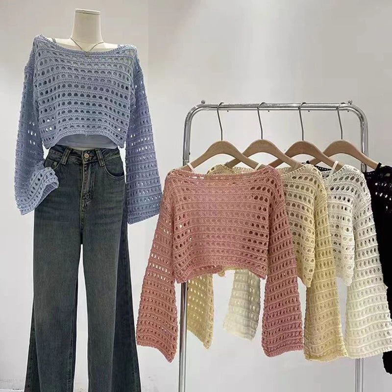 2024 Spring and Summer New French Short Long Sleeve Hollow Sweater Women's Design Sense Thin Type Sunscreen Smock Top Fleece Sweater Nylon Polyester 2024 Spring and Summer New French Short Long Sleeve Hollow Sweater Women's Design Sense Thin Type Sunscreen Smock Top Fleece Sweater Nylon Polyester